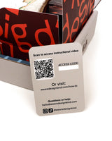 Card with QR code and text for accessing an instructional video and website.
