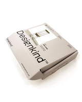 Designkind product packaging on a white background